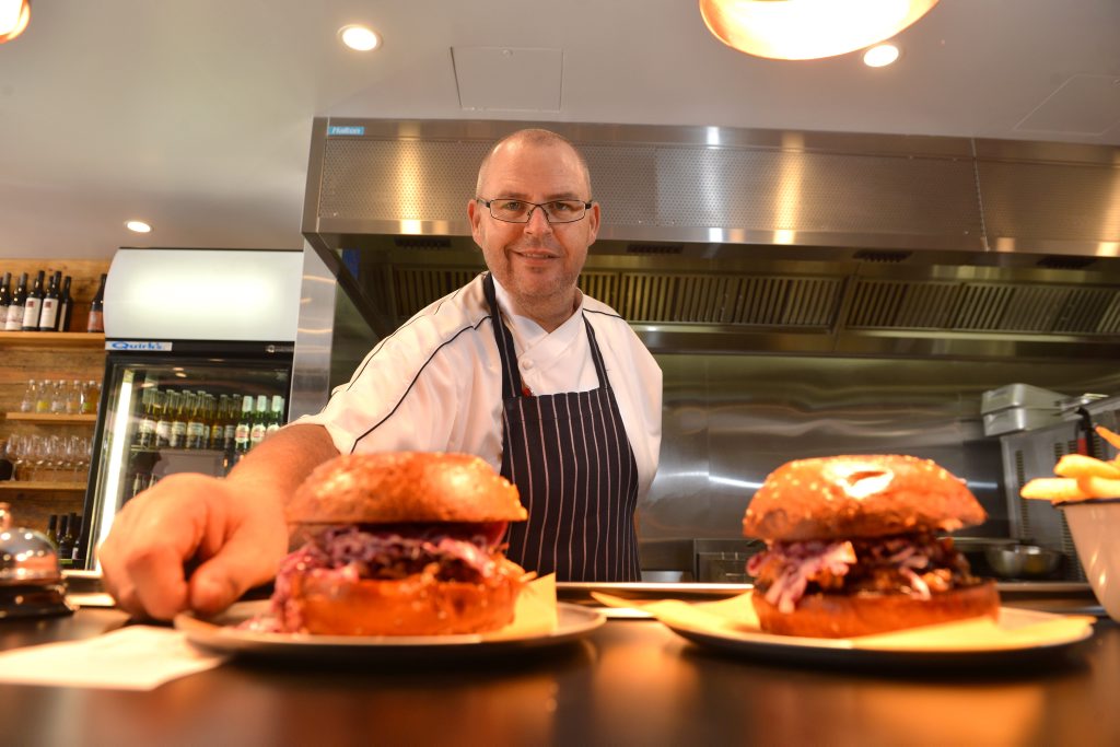 Tony Kelly will be available for photo at Hello Harry burger joint in Ocean St all afternoon . They ve cooked 3000 burgers over four days so have been very busy. Photo: Warren Lynam / Sunshine Coast Daily