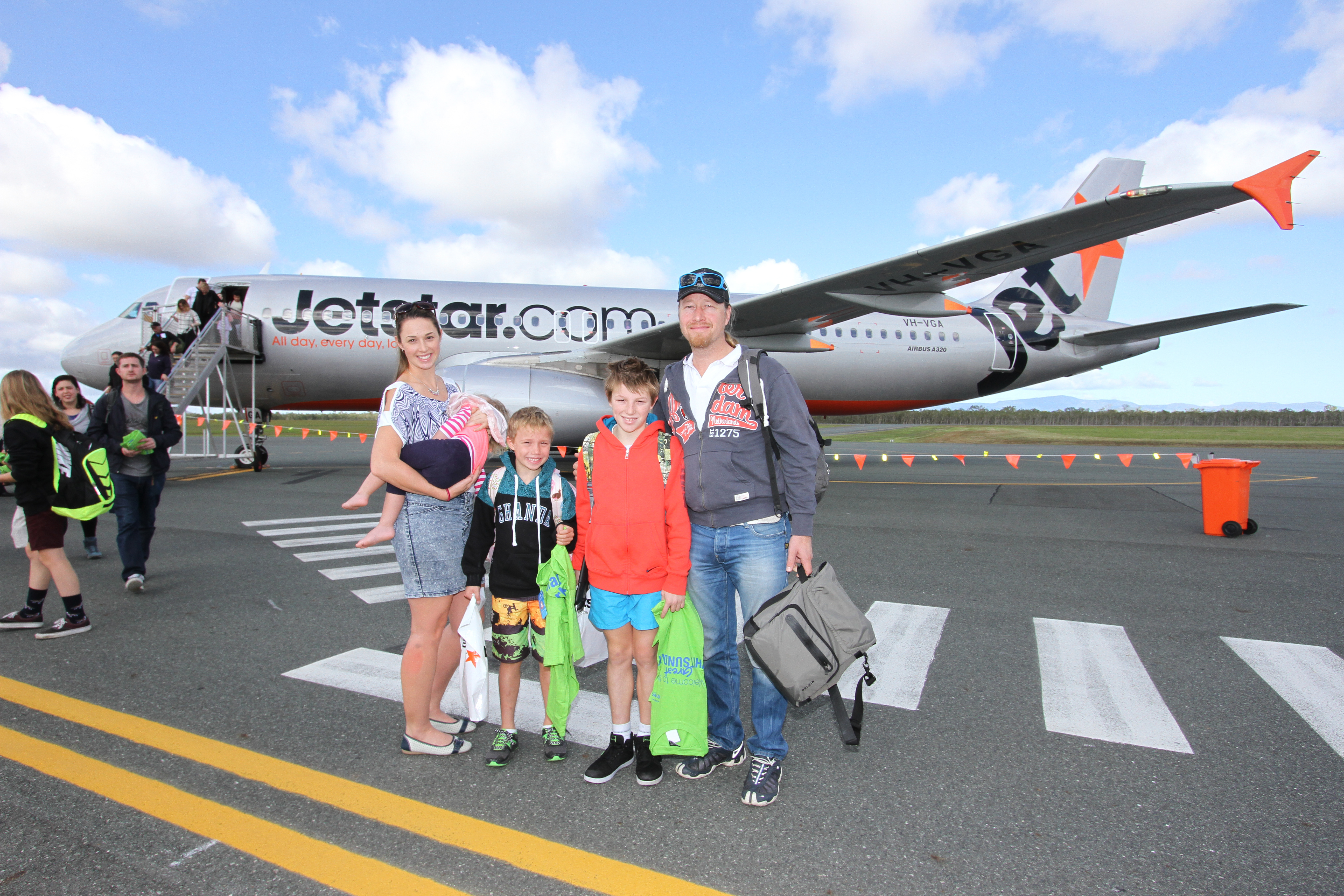 Smiles all round for first flight