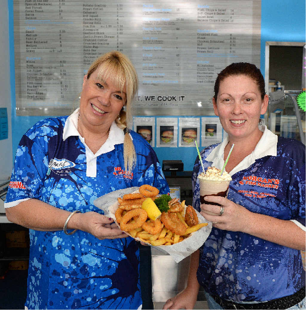 HAPPY STAFF: At Morgan’s Fish Market and Take Away in North Mackay are Kelly Morgan and Trish Tait. HAPPY STAFF: At Morgan’s Fish Market and Take Away in North Mackay are Kelly Morgan and Trish Tait.