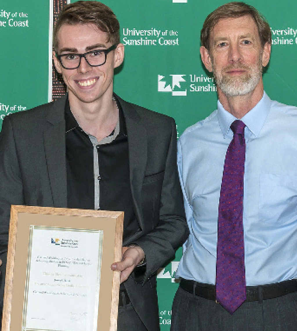DELIGHTED: Joe Hirst (left), who is one of five winners of the USC Faculty of Arts and Business awards, with Ken Waddington, whose firm Garland Waddington Solicitors donated the prizes. DELIGHTED: Joe Hirst (left), who is one of five winners of the USC Faculty of Arts and Business awards, with Ken Waddington, whose firm Garland Waddington Solicitors donated the prizes.