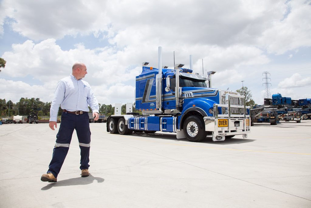BETTER TIMES: Jon Kelly ordered Big Dog and 40 more Mack trucks last year, however this year the company went into administration. BETTER TIMES: Jon Kelly ordered Big Dog and 40 more Mack trucks last year, however this year the company went into administration.