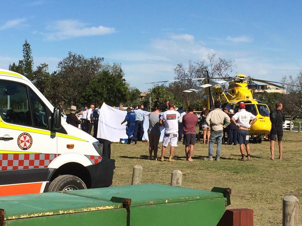 Paramedics tend to the victim of a shark attack at Lighthouse Beach, Ballina this morning. Paramedics tend to the victim of a shark attack at Lighthouse Beach, Ballina this morning.