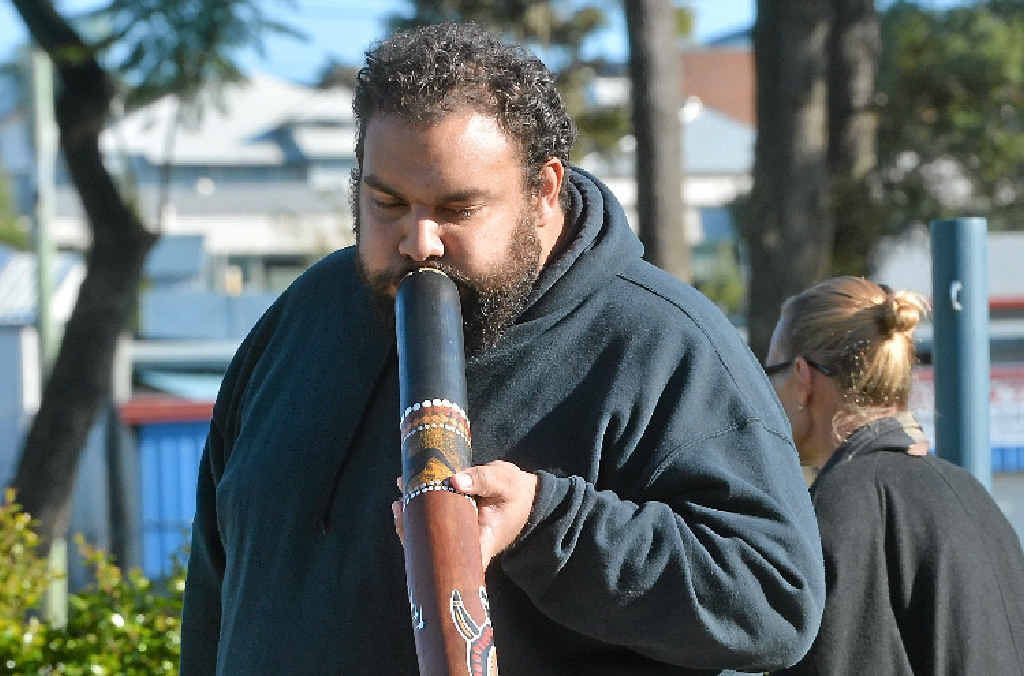 CULTURE: Dan Neill plays the didgeridoo at the NAIDOC flag-raising ceremony. CULTURE: Dan Neill plays the didgeridoo at the NAIDOC flag-raising ceremony.