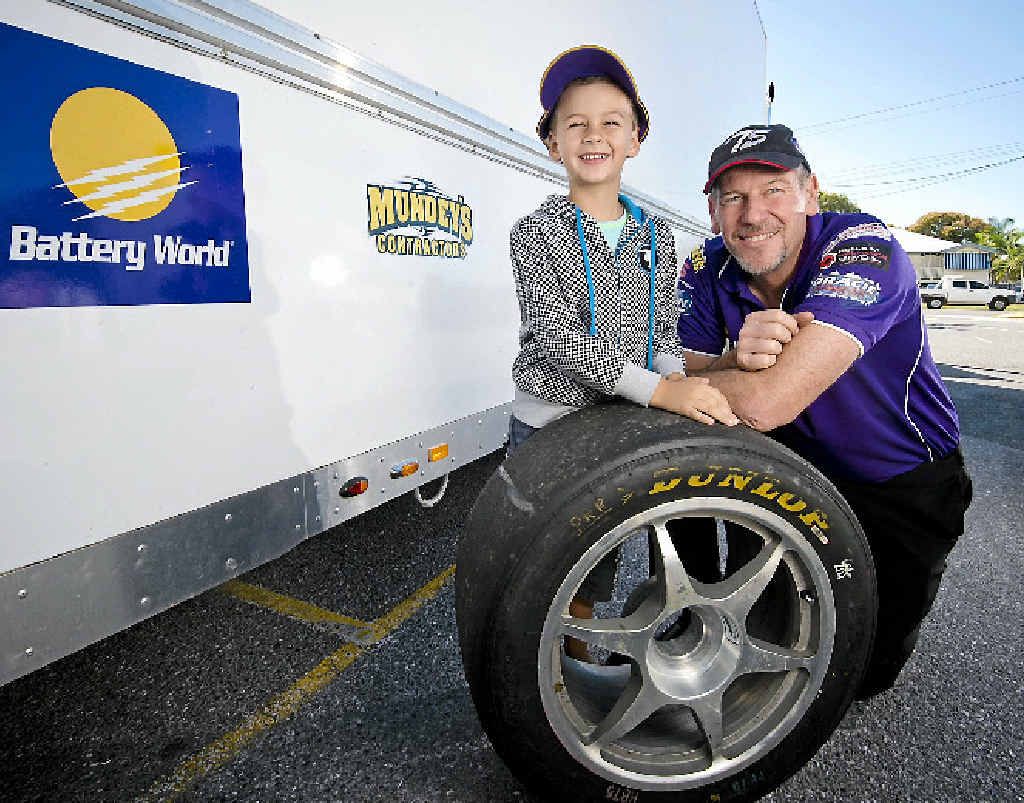 STARSTRUCK: Keen V8 fan Zac Badham, 6, was delighted to meet Dunlop Series V8 supercar driver Aaron ‘Marathon Man’ McGill at Battery World before his last Townsville 400 this weekend. STARSTRUCK: Keen V8 fan Zac Badham, 6, was delighted to meet Dunlop Series V8 supercar driver Aaron ‘Marathon Man’ McGill at Battery World before his last Townsville 400 this weekend.