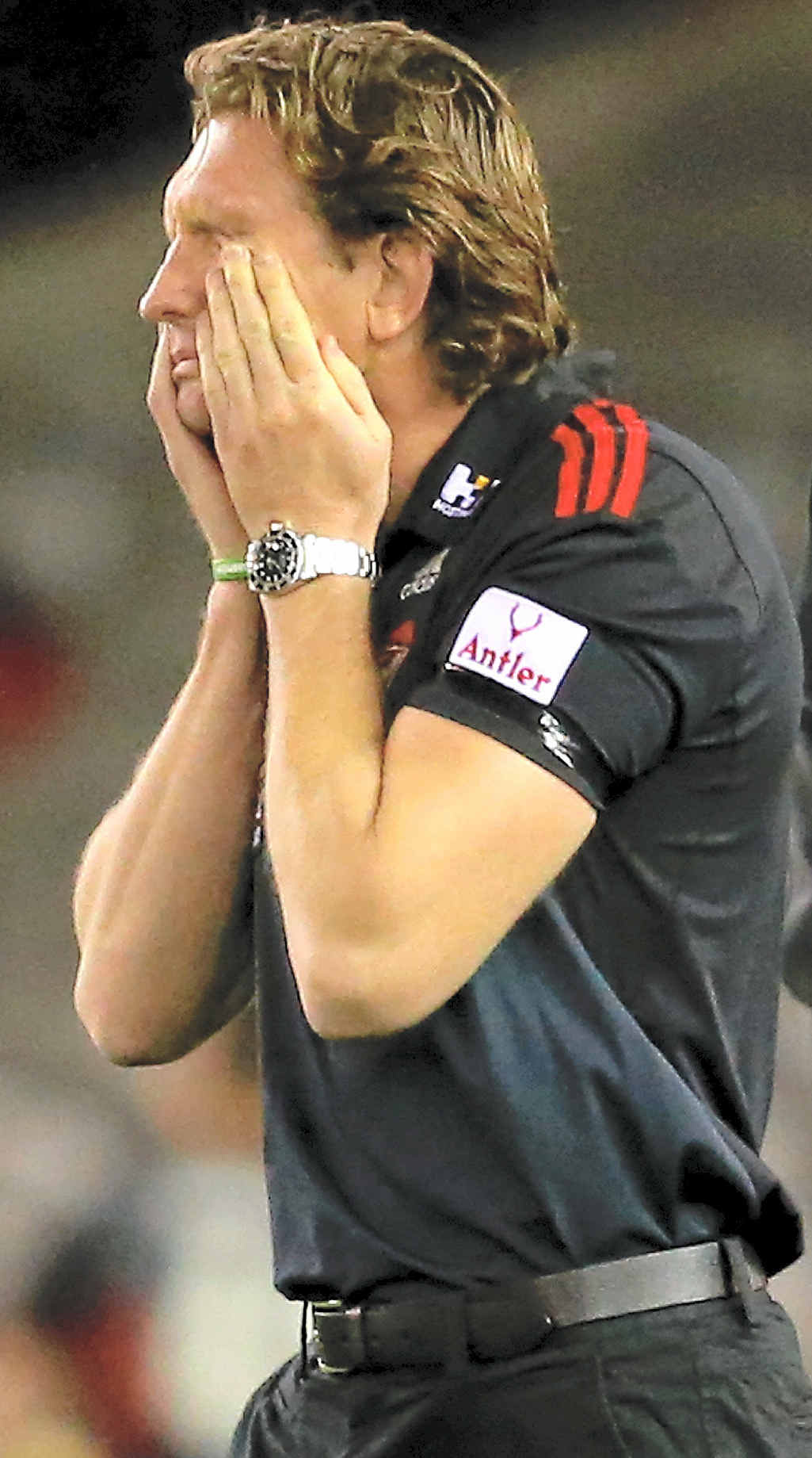 CAN’T BELIEVE WHAT HE’S SEEING: Bombers coach James Hird rubs his eyes during the heavy defeat to the Saints. CAN’T BELIEVE WHAT HE’S SEEING: Bombers coach James Hird rubs his eyes during the heavy defeat to the Saints.