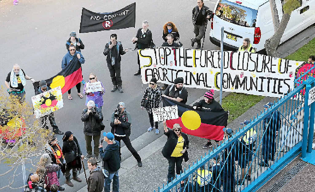 MULTIPLE ISSUES: A group of protesters outside the meeting in Sydney. MULTIPLE ISSUES: A group of protesters outside the meeting in Sydney.