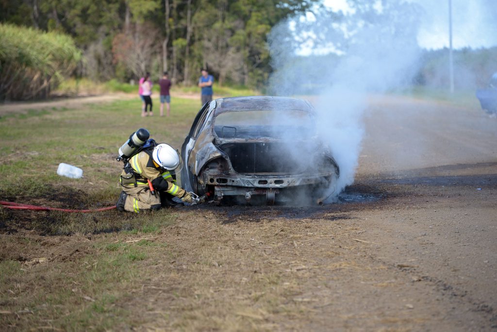 CAR FIRE: Emergency services attend the scene of a car fire on Woods Road in Alloway, nobody was injured. Photo taken on Monday, 7 July 2015. Photo: Max Fleet / NewsMail CAR FIRE: Emergency services attend the scene of a car fire on Woods Road in Alloway, nobody was injured. Photo taken on Monday, 7 July 2015. Photo: Max Fleet / NewsMail