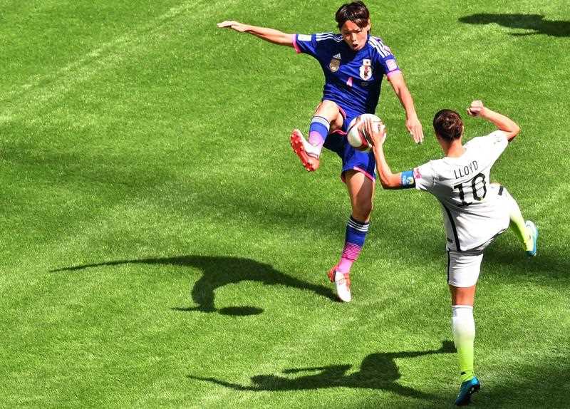 Japan's Saki Kumagai (L) and USA's Carli Lloyd vie for the ball during the 2015 FIFA Women's World Cup final between the USA and Japan at BC Place Stadium in Vancouver, British Columbia on July 5, 2015. Japan's Saki Kumagai (L) and USA's Carli Lloyd vie for the ball during the 2015 FIFA Women's World Cup final between the USA and Japan at BC Place Stadium in Vancouver, British Columbia on July 5, 2015.