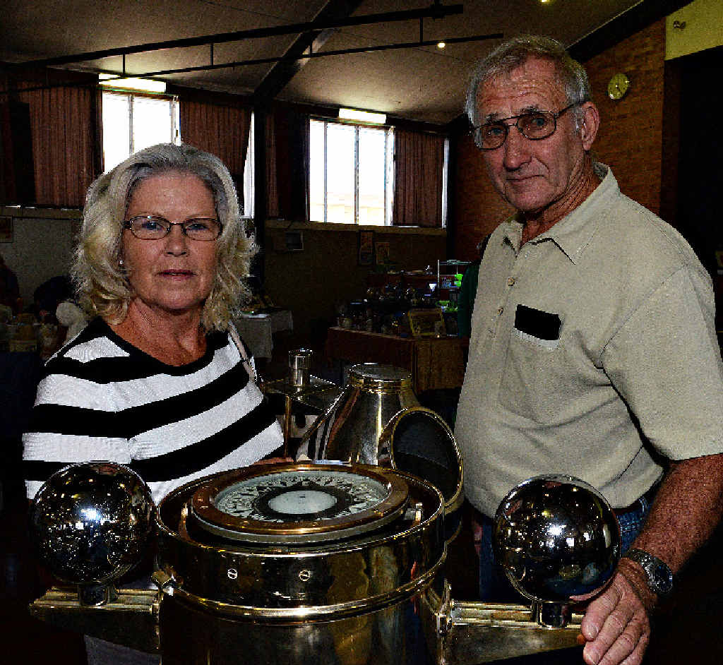 SOMETHING OLD: Maureen and Larry Cox check out an Australian warship compass at Saturday’s Bundaberg Antique Collectable Fair. SOMETHING OLD: Maureen and Larry Cox check out an Australian warship compass at Saturday’s Bundaberg Antique Collectable Fair.