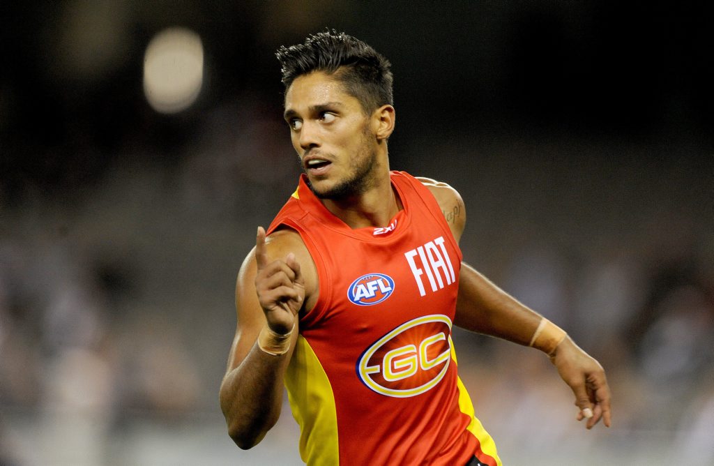 Aaron Hall of Gold Coast celebrates after kicking a goal, during the Round 9 AFL match between the St Kilda Saints and the Gold Coast Suns at Etihad Stadium in Melbourne, Sunday, May 18, 2014. (AAP Image/Joe Castro) NO ARCHIVING, EDITORIAL USE ONLY Aaron Hall of Gold Coast celebrates after kicking a goal, during the Round 9 AFL match between the St Kilda Saints and the Gold Coast Suns at Etihad Stadium in Melbourne, Sunday, May 18, 2014. (AAP Image/Joe Castro) NO ARCHIVING, EDITORIAL USE ONLY