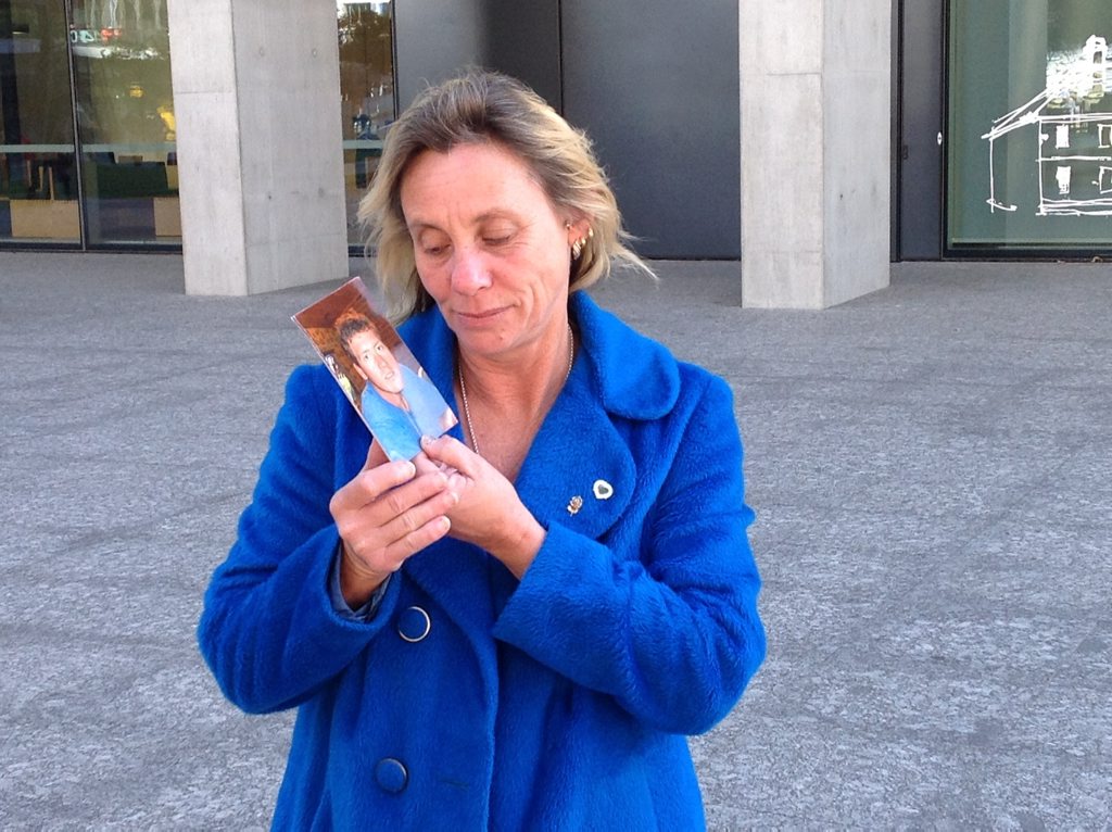 Bucca mother Nary Duke outside BDC with a picture of her son Rhogan Eric Stanley Duke, 21, who was killed in a crash at Coonarr in January, 2014. Picture: Adam Davies Bucca mother Nary Duke outside BDC with a picture of her son Rhogan Eric Stanley Duke, 21, who was killed in a crash at Coonarr in January, 2014. Picture: Adam Davies