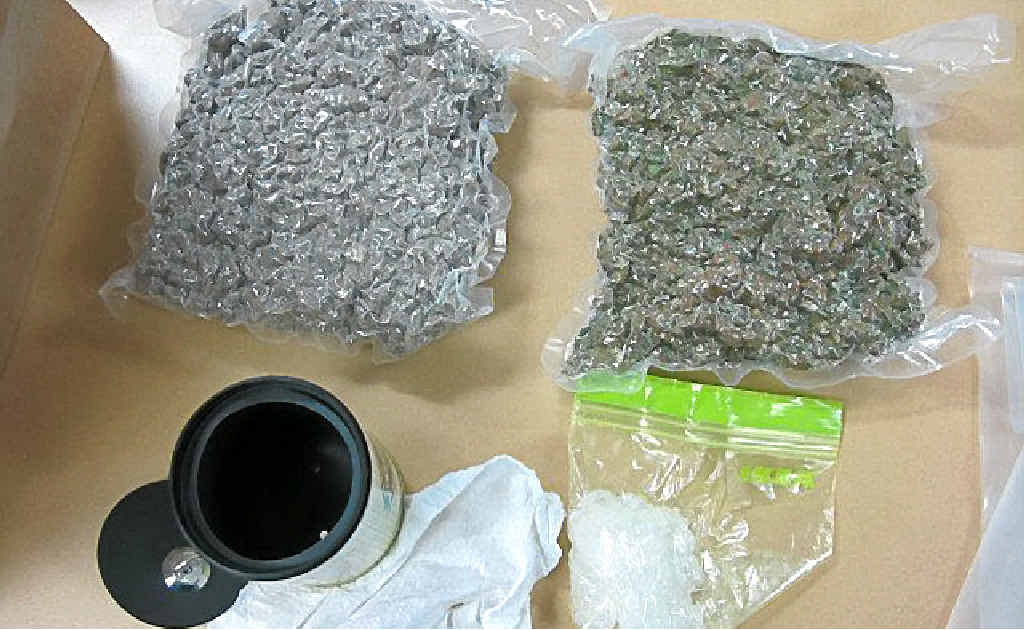 CHARGED: Two men have been charged after police found two vacuum sealed bags containing about 900g of dried cannabis in a vehicle search at the weekend. CHARGED: Two men have been charged after police found two vacuum sealed bags containing about 900g of dried cannabis in a vehicle search at the weekend.