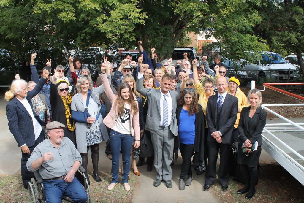 Lawyer Cameron Bell (second from right) is considering a class action case against CSG companies in the Surat Basin. Lawyer Cameron Bell (second from right) is considering a class action case against CSG companies in the Surat Basin.