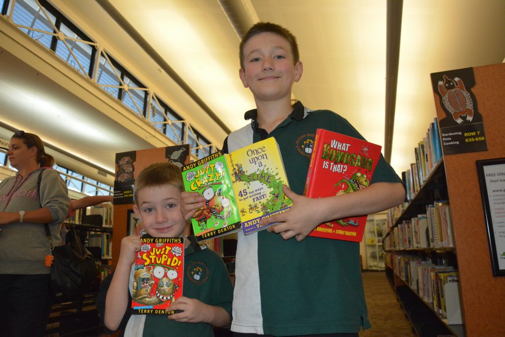 Elliot Smith, 5, and Robbie Smith, 10. Robbie said one of his favourite books was Once Upon a Slime - how to start writing. At author Andy Griffith's book signing at Gladstone City Library on Tuesday. 