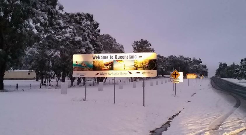 The iconic snow-covered welcome to Queensland sign. The iconic snow-covered welcome to Queensland sign.