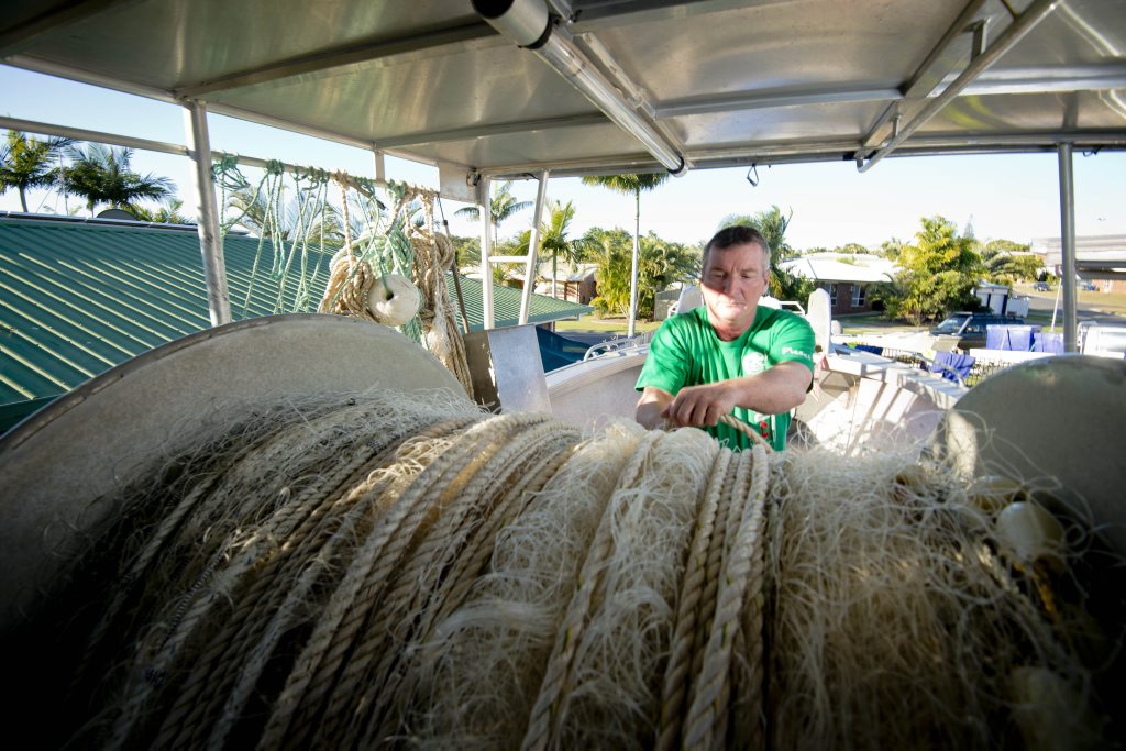 Tannum Sands commercial fisherman Dane King is fighting a losing battle trying to keep his nets in the water. Tannum Sands commercial fisherman Dane King is fighting a losing battle trying to keep his nets in the water.
