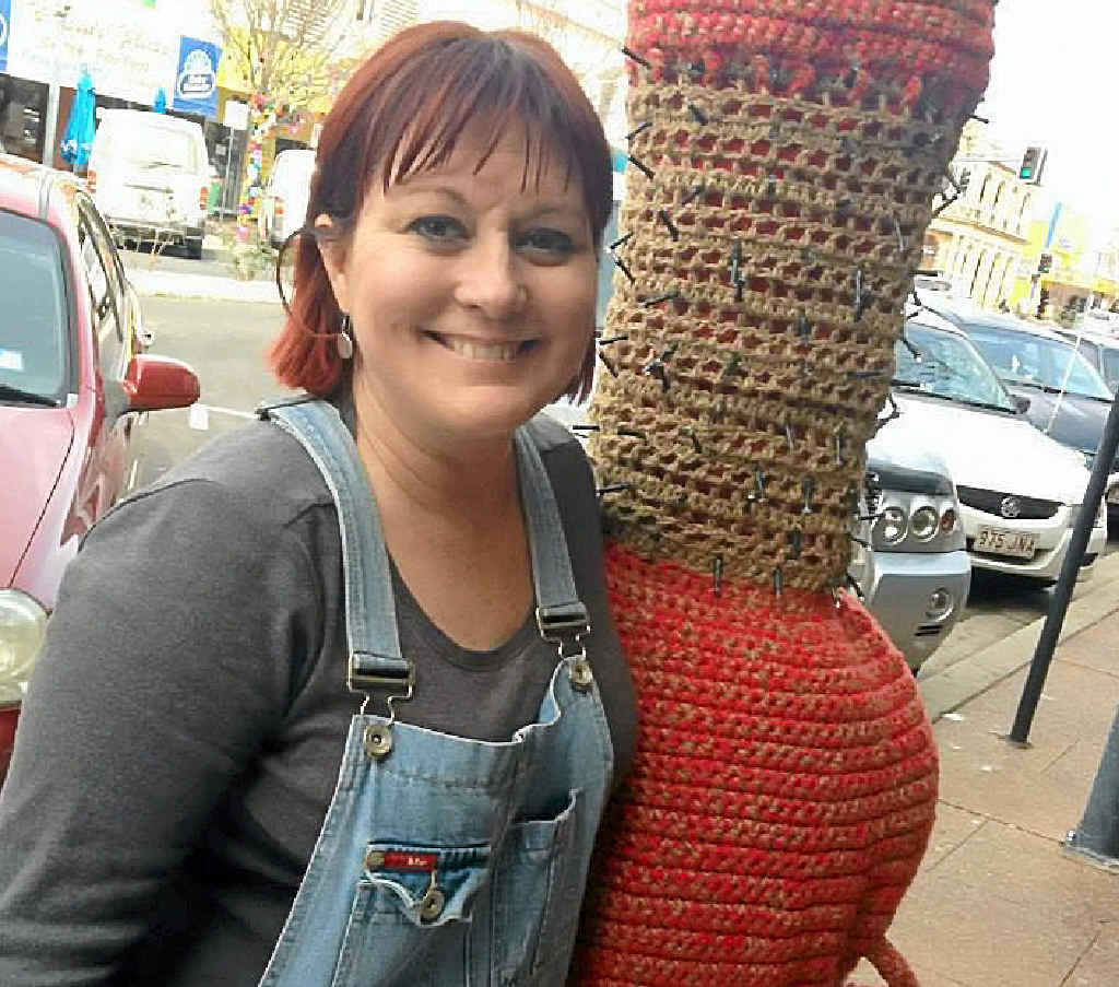 Jessica Thompson won the excellence in knitting and crochet for her red tree monster, Scarlett. She has entered a tree jumper in 11 of the 12 Jumpers and Jazz in July festivals. Jessica Thompson won the excellence in knitting and crochet for her red tree monster, Scarlett. She has entered a tree jumper in 11 of the 12 Jumpers and Jazz in July festivals.