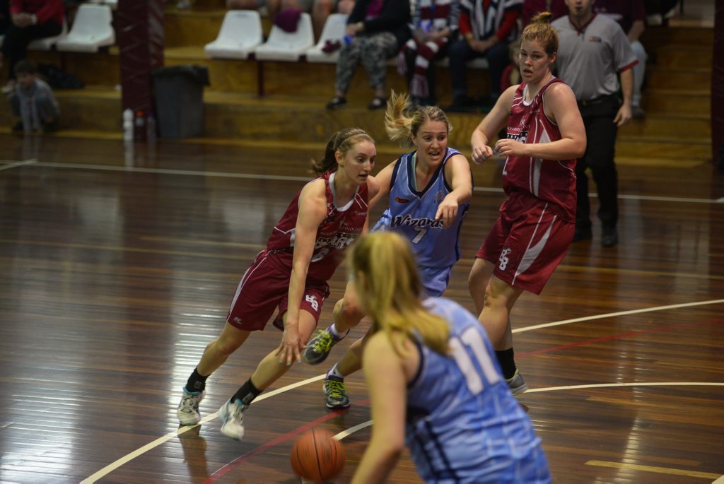 Bulls' Caitlin Clancy is one of many players to return from a successful stint playing college basketball in America. Bulls' Caitlin Clancy is one of many players to return from a successful stint playing college basketball in America.