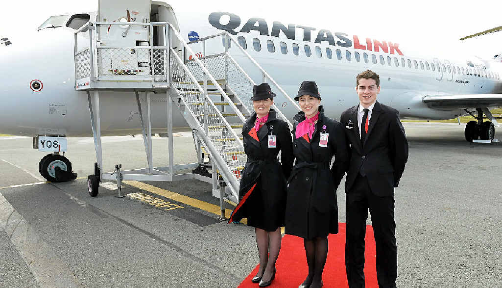 TOUCH DOWN: The Flying Kangaroo Qantas bounds into the Sunshine Coast, with cabin crew Natalie Quayle, Grace Coffee and Alexander Barns. TOUCH DOWN: The Flying Kangaroo Qantas bounds into the Sunshine Coast, with cabin crew Natalie Quayle, Grace Coffee and Alexander Barns.