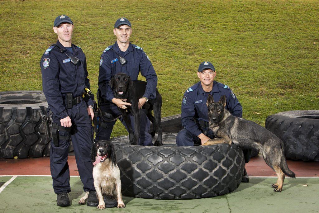 The newest doggie recruits to the Queensland Police Service with their handlers. The newest doggie recruits to the Queensland Police Service with their handlers.
