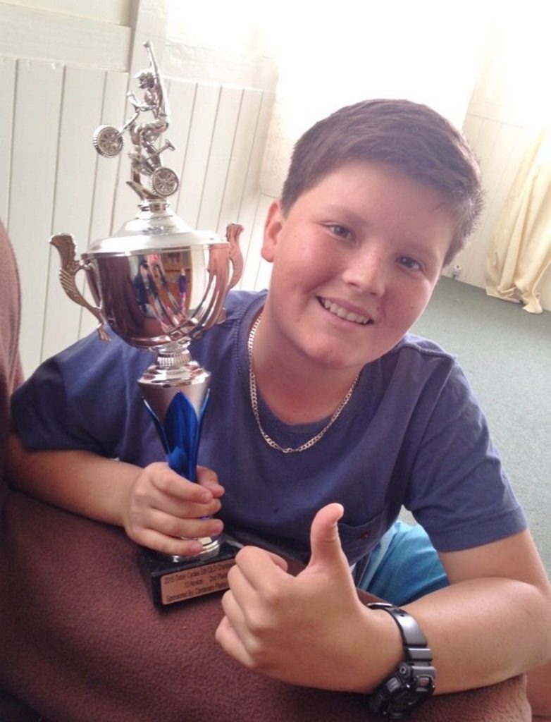 Allora's Dustin Cunning with his trophy won at the recent South Queensland BMX Titles.