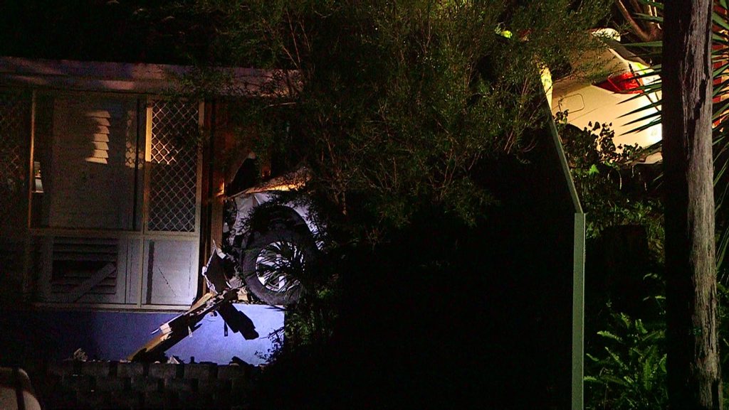 A couple were woken with a fright when a 4WD crashed through their bedroom wall in Korora. A couple were woken with a fright when a 4WD crashed through their bedroom wall in Korora.