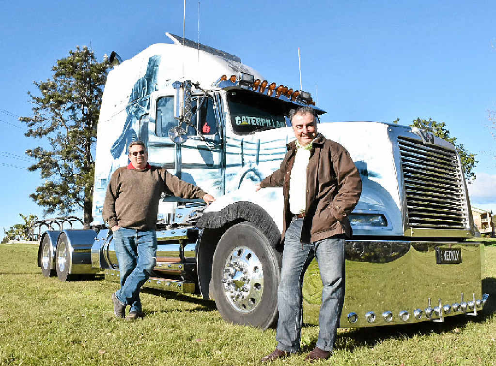 ATTRACTION: Stuart George and Andrew “Scuzzy” McSweeny with truck Ned Kelly. ATTRACTION: Stuart George and Andrew “Scuzzy” McSweeny with truck Ned Kelly.