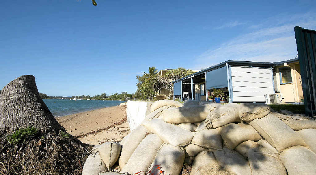 WASHING AWAY: Residents along Island Esplanade are building their own walls fearing erosion may wash their properties away. WASHING AWAY: Residents along Island Esplanade are building their own walls fearing erosion may wash their properties away.