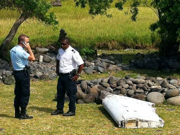 Police guard the unidentified plane wreckage. Police guard the unidentified plane wreckage.