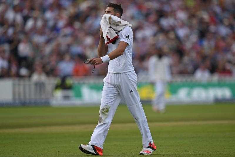 England's James Anderson walks back to the pavilion after coming off injured mid-over on the second day of the third Ashes cricket test match between England and Australia at Edgbaston in Birmingham, central England, on July 30, 2015. England's James Anderson walks back to the pavilion after coming off injured mid-over on the second day of the third Ashes cricket test match between England and Australia at Edgbaston in Birmingham, central England, on July 30, 2015.