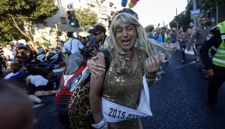 A parade participant cries out as an Orthodox extremist attacks pride parade participants A parade participant cries out as an Orthodox extremist attacks pride parade participants