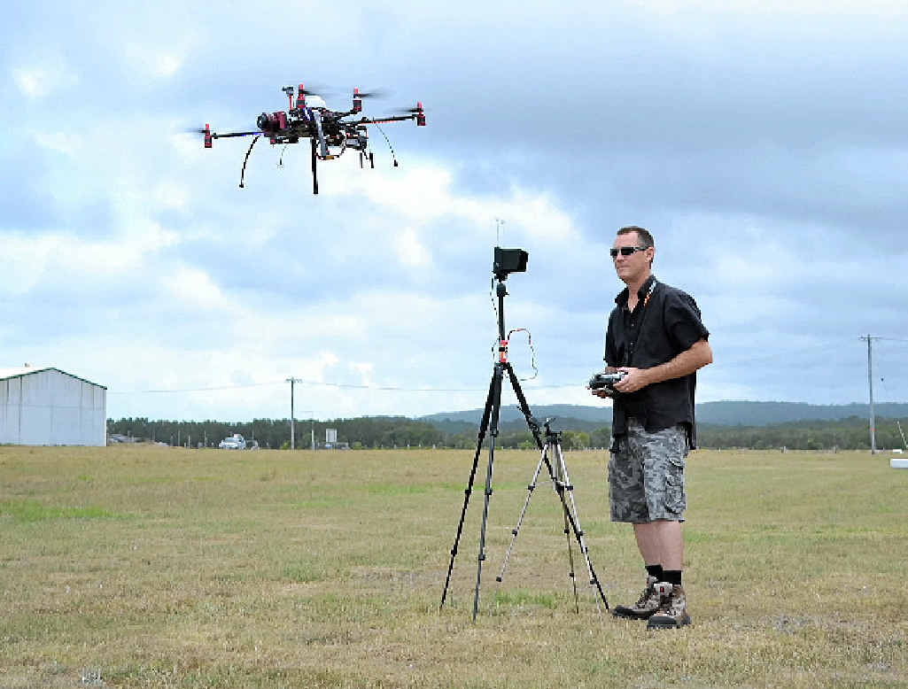 Evans Head UAV operator Mark Flaherty of MJ Visual Media captured the photo of two sharks off Evans Head near a surfer with his drone camera. Evans Head UAV operator Mark Flaherty of MJ Visual Media captured the photo of two sharks off Evans Head near a surfer with his drone camera.