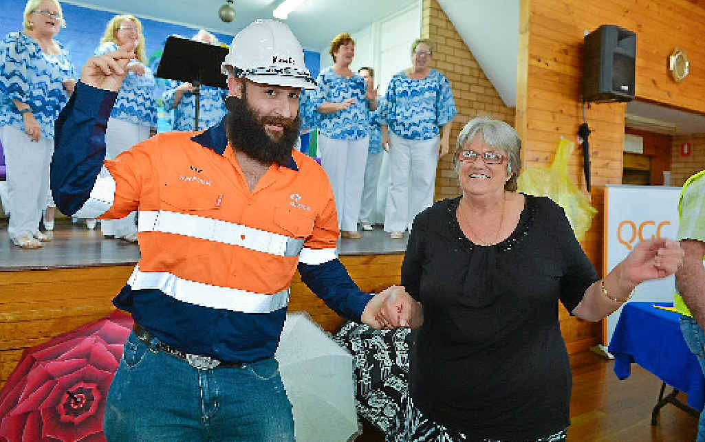 OUT OF THE WOODWORK: Raul Goldenberg (left) and Glenys Middleton dance up a storm at the Raise the Roof concert on Friday. OUT OF THE WOODWORK: Raul Goldenberg (left) and Glenys Middleton dance up a storm at the Raise the Roof concert on Friday.