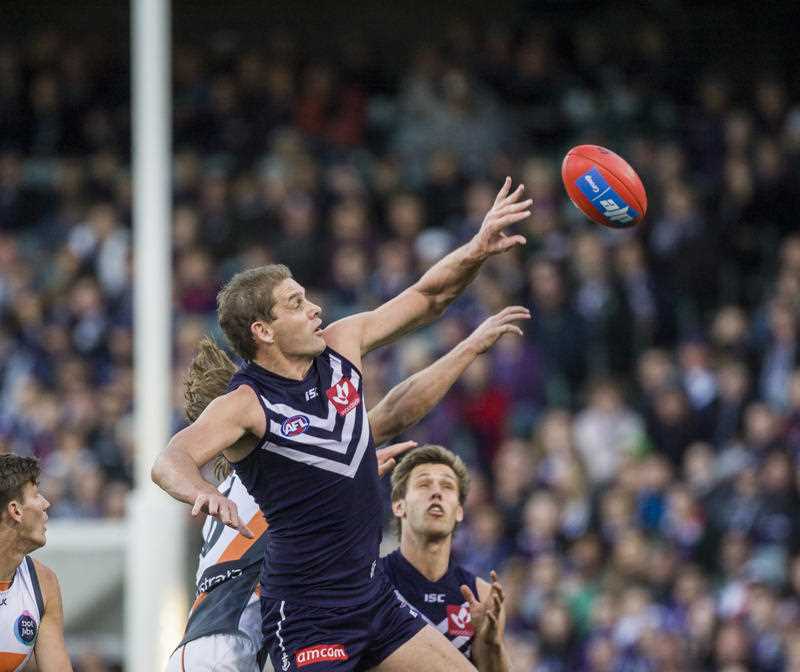 Aaron Sandilands of the Fremantle Dockers during the Round 18 AFL match between the Fremantle Dockers and Greater Western Sydney at the Domain Stadium in Perth, Sunday, August 2, 2015.Fremantle won the match 84-63. Aaron Sandilands of the Fremantle Dockers during the Round 18 AFL match between the Fremantle Dockers and Greater Western Sydney at the Domain Stadium in Perth, Sunday, August 2, 2015.Fremantle won the match 84-63.