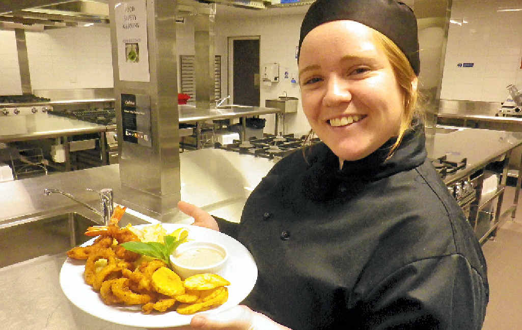 Trinity hospitality student Aimee Malaquin showing off a freshly prepared dish. Trinity hospitality student Aimee Malaquin showing off a freshly prepared dish.