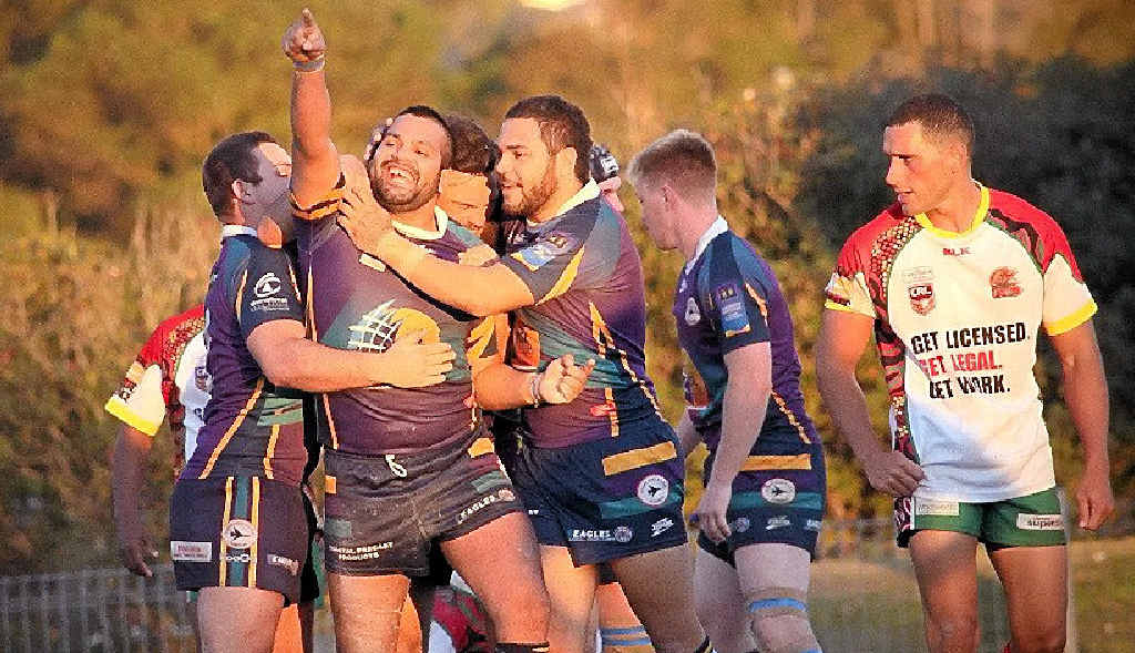 WE DID IT: Bombers ecstatic over a win against Northern United in Lismore. WE DID IT: Bombers ecstatic over a win against Northern United in Lismore.