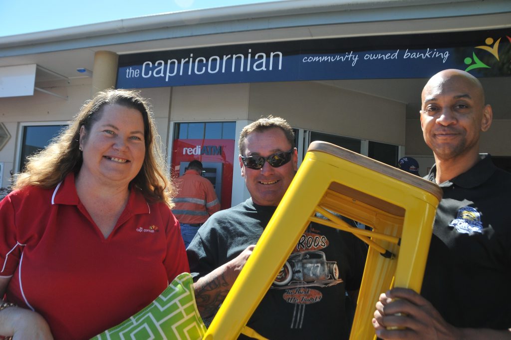 The Capricornian Gladstone branch manager Faith Hutchinson, $5000 furniture winner Lou Maday, and Derek Rucker, head coach of Port City Power. The Capricornian Gladstone branch manager Faith Hutchinson, $5000 furniture winner Lou Maday, and Derek Rucker, head coach of Port City Power.