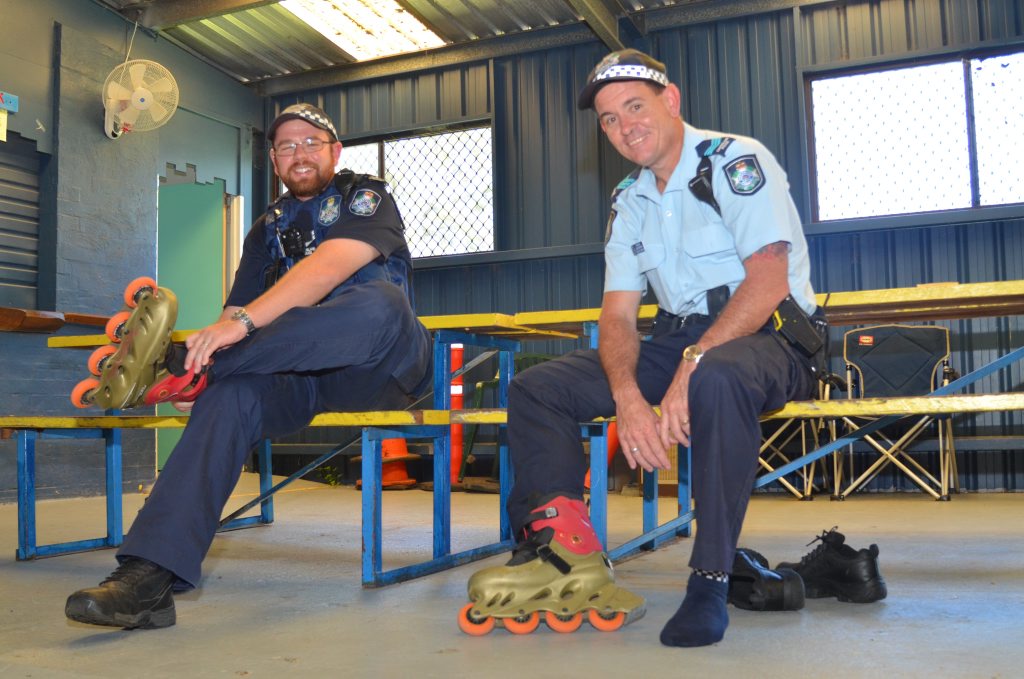 SKATES ON: Brett Lowien and Jason Newton will be switching the black boots for skates tonight. Photo Barclay White / South Burnett Times SKATES ON: Brett Lowien and Jason Newton will be switching the black boots for skates tonight. Photo Barclay White / South Burnett Times