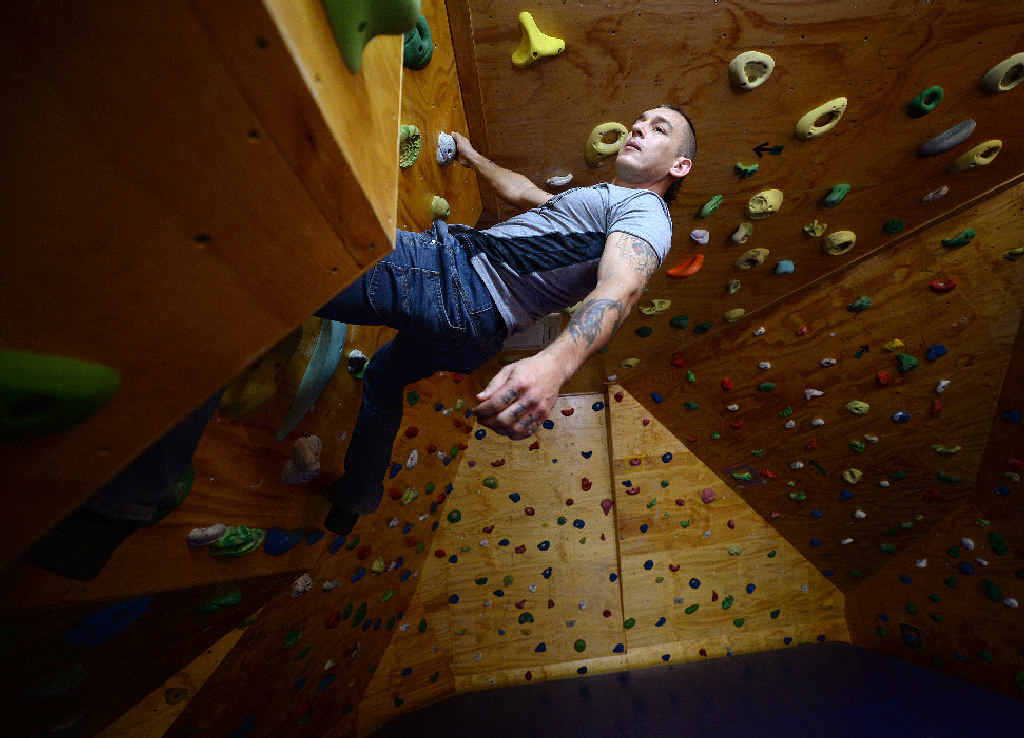 A Plus Indoor Sports Centre manager Shaun Cuso using the indoor rock climbing facility. A Plus Indoor Sports Centre manager Shaun Cuso using the indoor rock climbing facility.