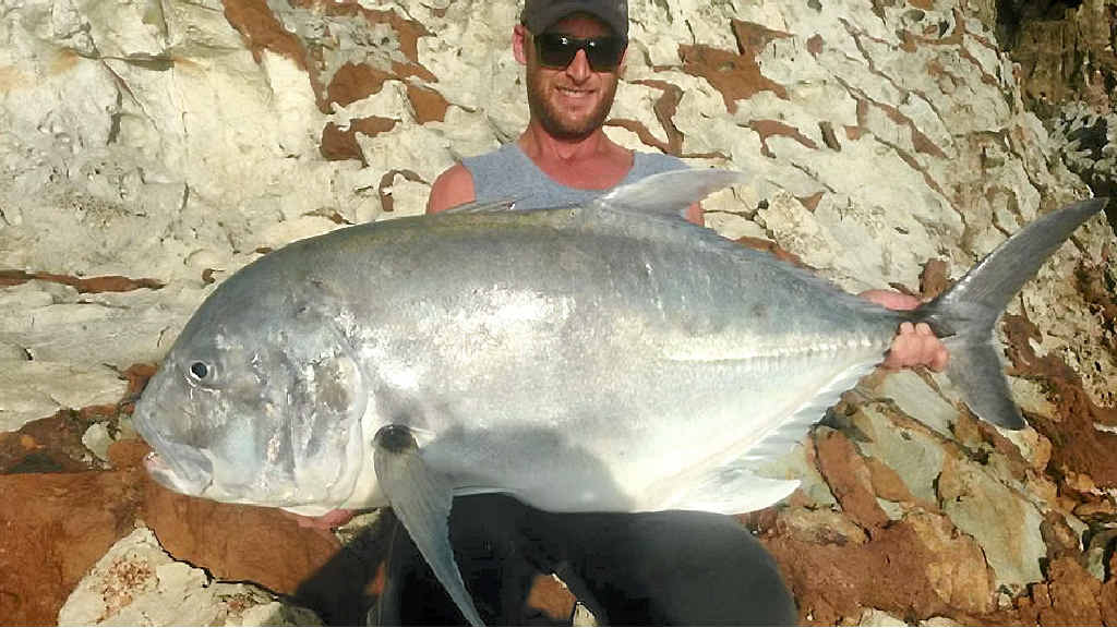 ARMS FULL: Rick Jeff with his awesome GT caught beneath the Boyne River Bridge this week. ARMS FULL: Rick Jeff with his awesome GT caught beneath the Boyne River Bridge this week.