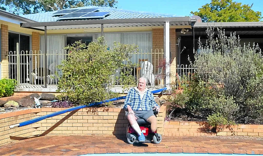 SOLAR SAVER: Kevin Toohill had solar panels installed as part of Origin Energy’s solar scheme. There are no up-front costs and he expects to save $400 per bill. SOLAR SAVER: Kevin Toohill had solar panels installed as part of Origin Energy’s solar scheme. There are no up-front costs and he expects to save $400 per bill.