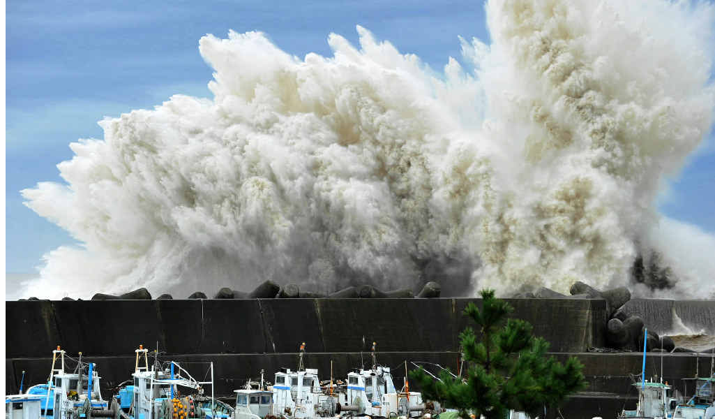 Surging waves hit against the breakwater in Udono in a port town of Kiho, Mie Prefecture, central Japan on September 21, 2011. Surging waves hit against the breakwater in Udono in a port town of Kiho, Mie Prefecture, central Japan on September 21, 2011.