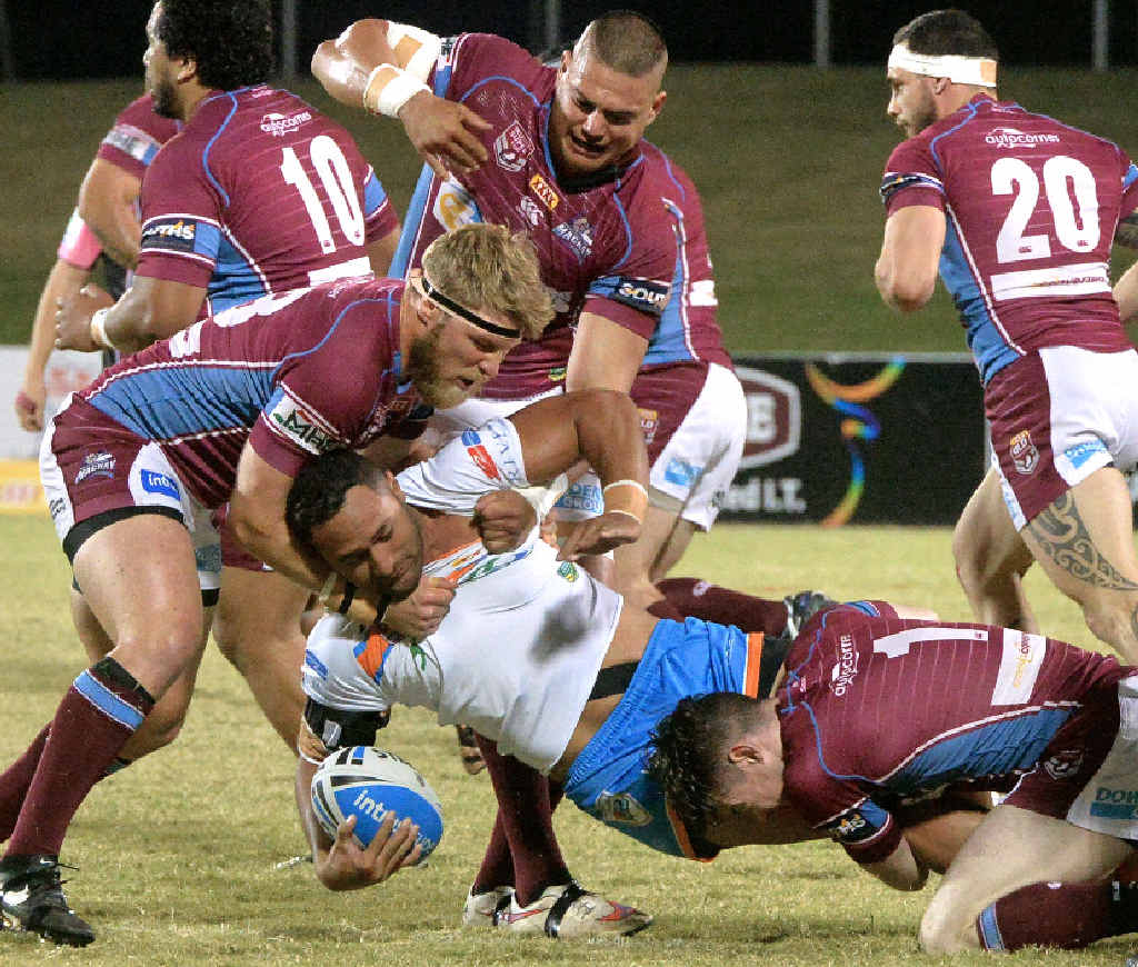 Northern Pride’s Patrick Kaufusi is tackled by Cutters Chris Gesch, Brad Lupi and Sam Clune Northern Pride’s Patrick Kaufusi is tackled by Cutters Chris Gesch, Brad Lupi and Sam Clune