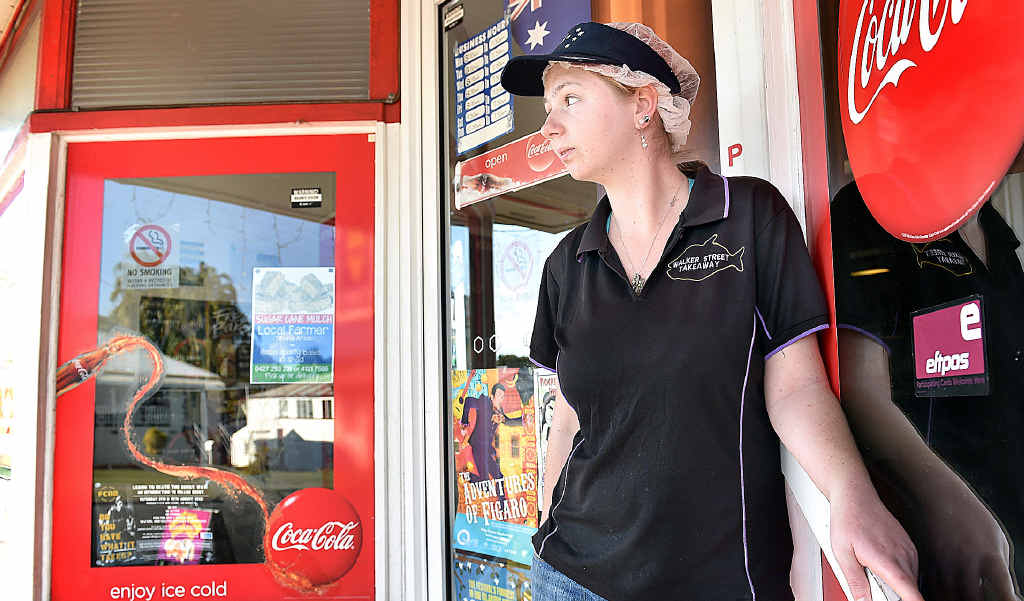FUNDS NEEDED: Caitlyn Polzin, youngest daughter of Teresa Pamenter who was injured in an accident that also claimed the life of her stepfather, outside the Walker Street Take Away that her mum managed. FUNDS NEEDED: Caitlyn Polzin, youngest daughter of Teresa Pamenter who was injured in an accident that also claimed the life of her stepfather, outside the Walker Street Take Away that her mum managed.