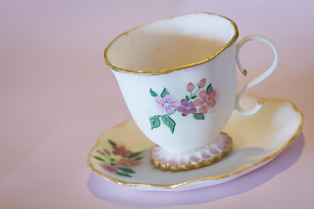 She threw a hot cup of tea on her partner that left him with a scalded chest. She threw a hot cup of tea on her partner that left him with a scalded chest.