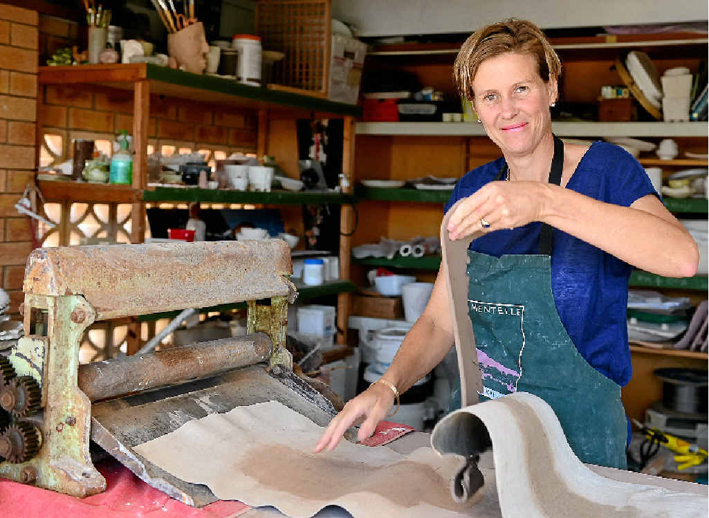 POTTY TIME: Busy mum Sarah Sheppard in her pottery studio in Golden Beach. POTTY TIME: Busy mum Sarah Sheppard in her pottery studio in Golden Beach.