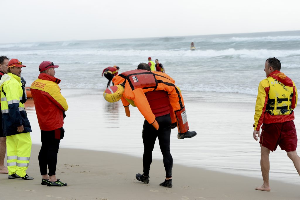 Surf lifesavers practise their skills using a life-size dummy at Lennox Head beach. Surf lifesavers practise their skills using a life-size dummy at Lennox Head beach.