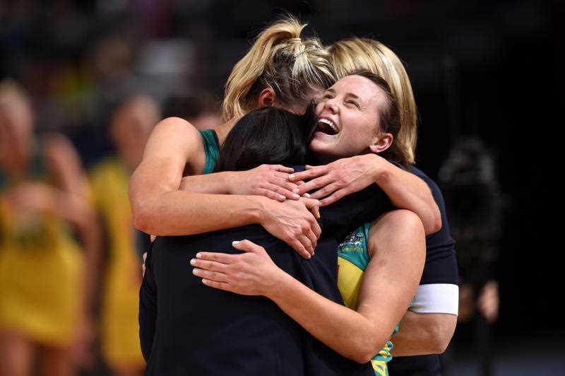 Head coach of Australia, Lisa Alexander (centre), is embraced by Laura Geitz (left) and Natalie Medhurst after their win against New Zealand during the gold medal match of the Netball World Cup at Allphones Arena in Sydney on Sunday, Aug. 16, 2015. Head coach of Australia, Lisa Alexander (centre), is embraced by Laura Geitz (left) and Natalie Medhurst after their win against New Zealand during the gold medal match of the Netball World Cup at Allphones Arena in Sydney on Sunday, Aug. 16, 2015.