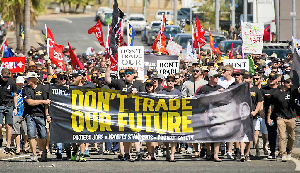Union members march in Gladstone over the China Australia free trade deal. Union members march in Gladstone over the China Australia free trade deal.