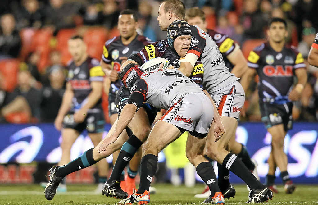 FAIR TACKLE: Nigel Plum of the Panthers is tackled during the match against the New Zealand Warriors. There is concern players could miss this year’s grand final if the NRL can’t clarify its confusing shoulder charge rule. FAIR TACKLE: Nigel Plum of the Panthers is tackled during the match against the New Zealand Warriors. There is concern players could miss this year’s grand final if the NRL can’t clarify its confusing shoulder charge rule.